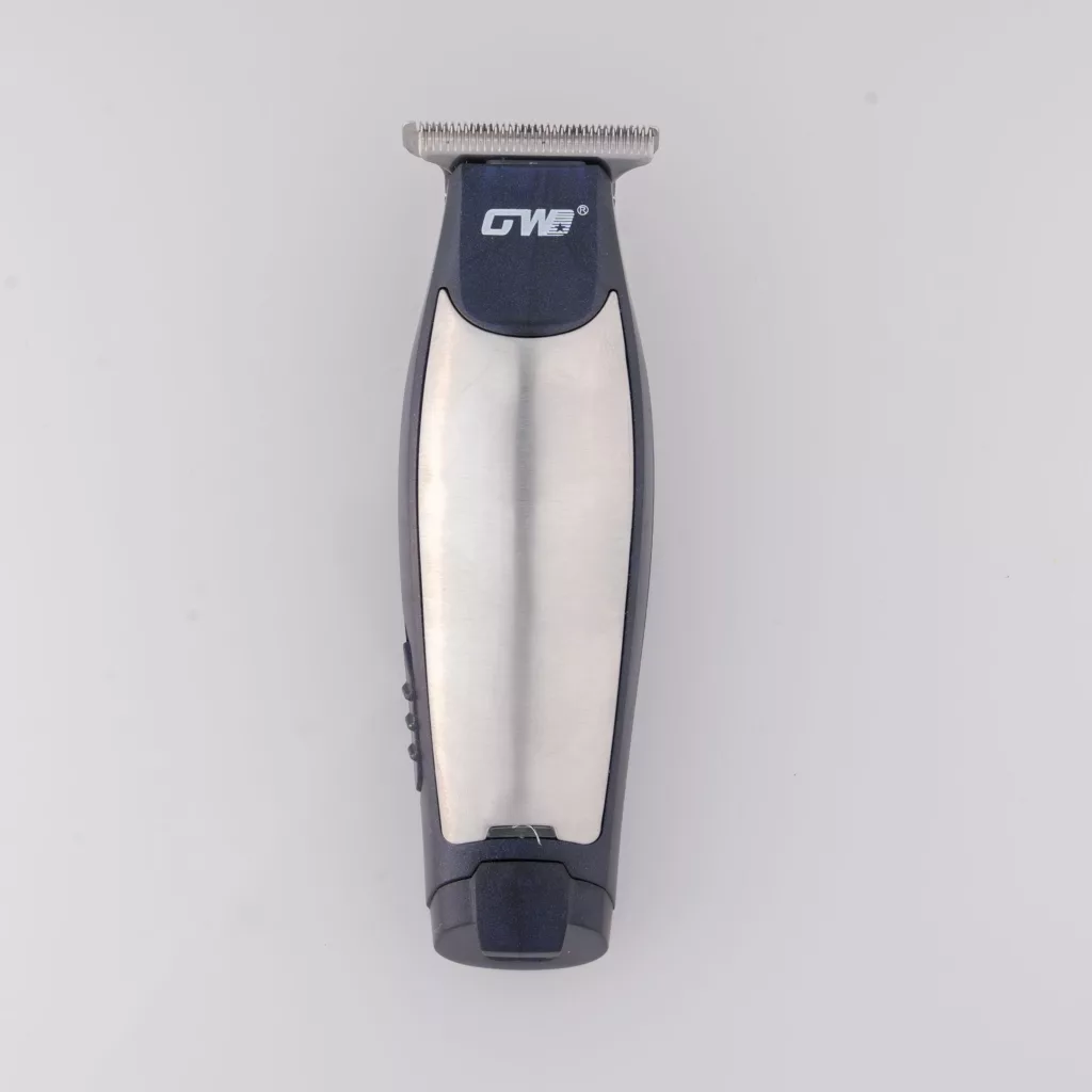 ماشین اصلاح موی سر و صورت شارژی جی دبلیو مدل G-9819، اصلاح به صورت خط زن و صفر زن، منبع انرژی با برق و باتری، تکنولوژی اصلاح به صورت تریمر، اندازه اصلاح 0.1 میلیمتر، مدت زمان شارژ 480 دقیقه و مدت زمان استفاده پس از شارژ 60 دقیقه، به همراه شارژر و روغن