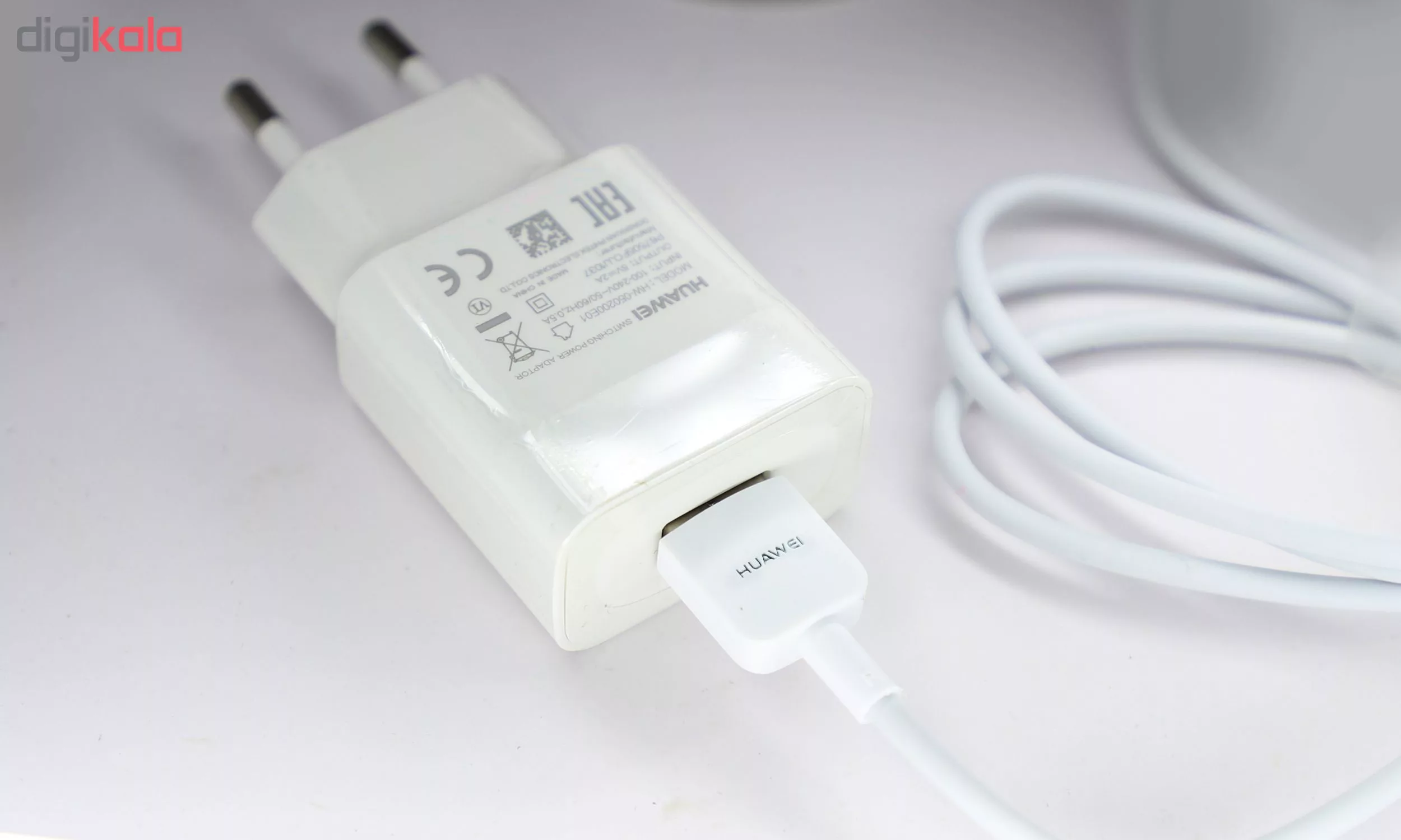 شارژر دیواری مدل HW-050200E01 به همراه کابل تبدیل microUSB