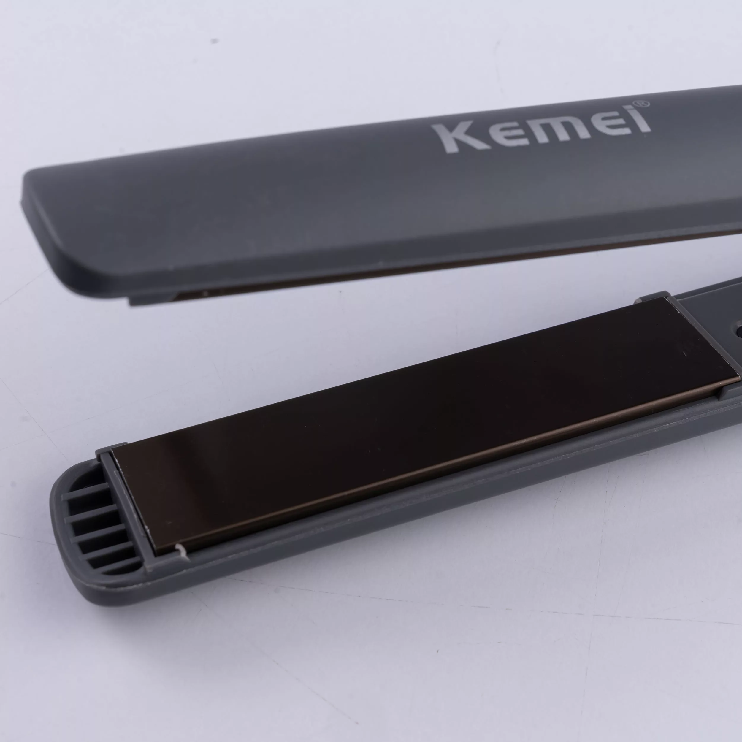 اتو و حالت دهنده ی مو کیمی مدل km9829