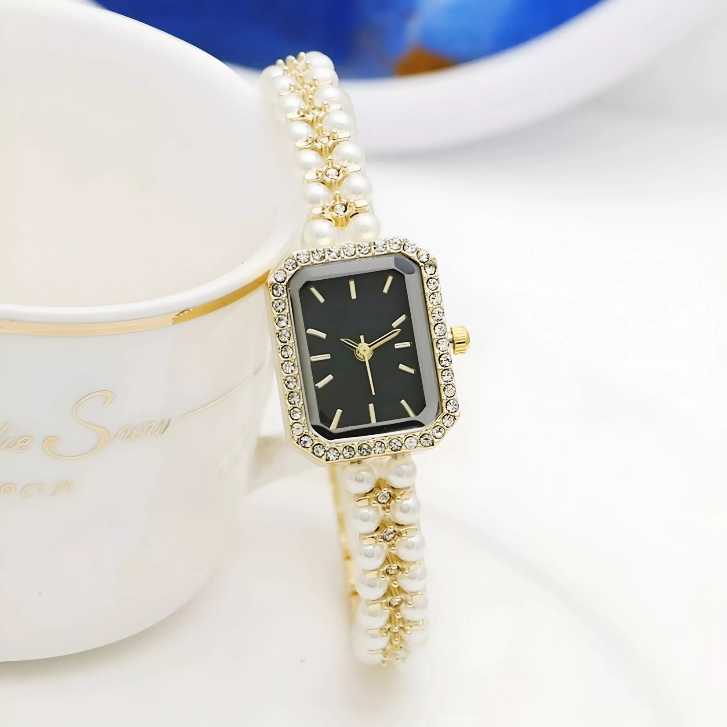 ساعت مچی عقربه‌ای کوارتز زنانه مدل لوکس بند مرواریدی دستبندی کد ۱