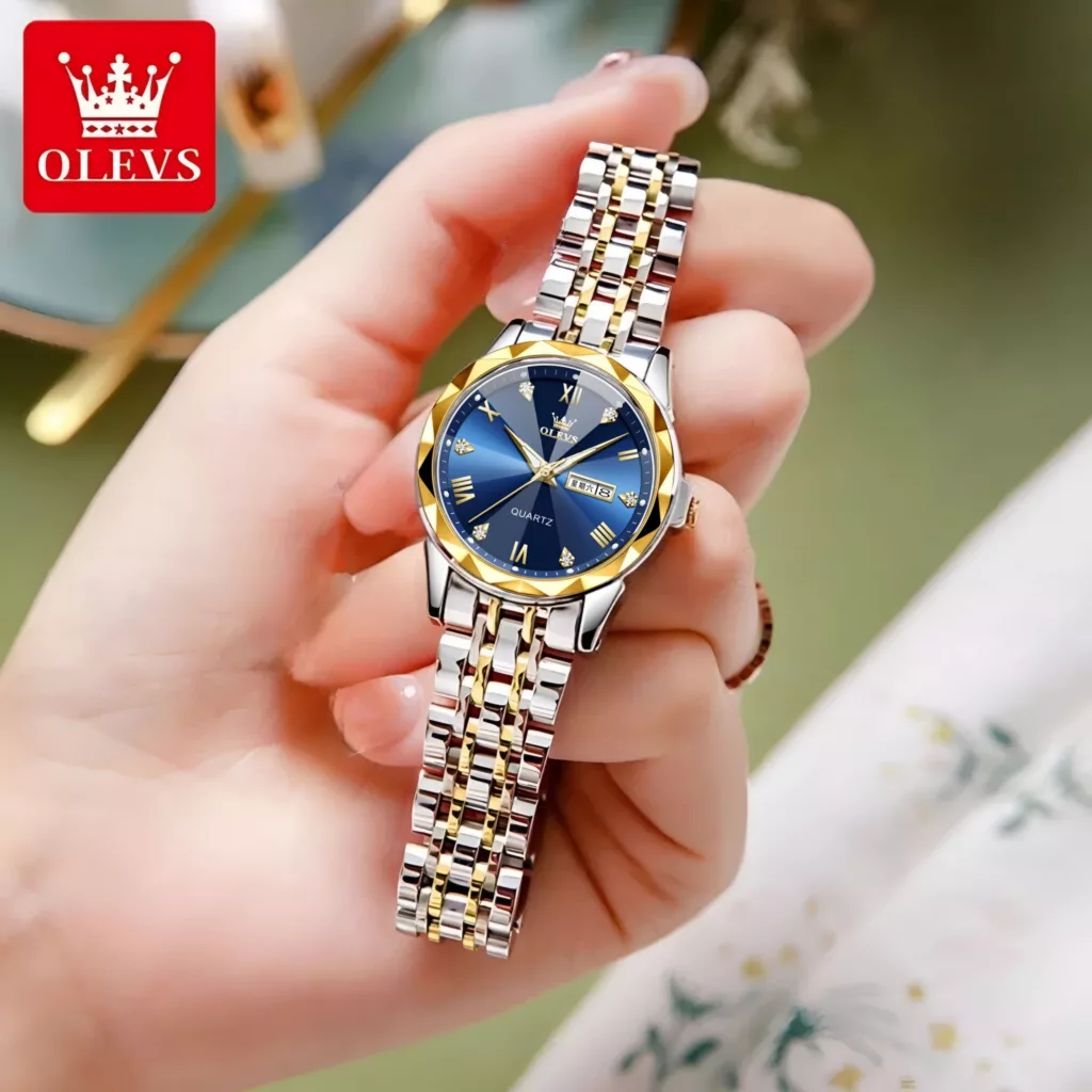 ساعت مچی عقربه‌ای کوارتز زنانه اُ لِوز مدل تک موتوره دی دیت بند استیل قفل مخفی کد b