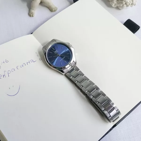 ساعت مچی عقربه ای زنانه کیو اند کیو مدل qa07j202y