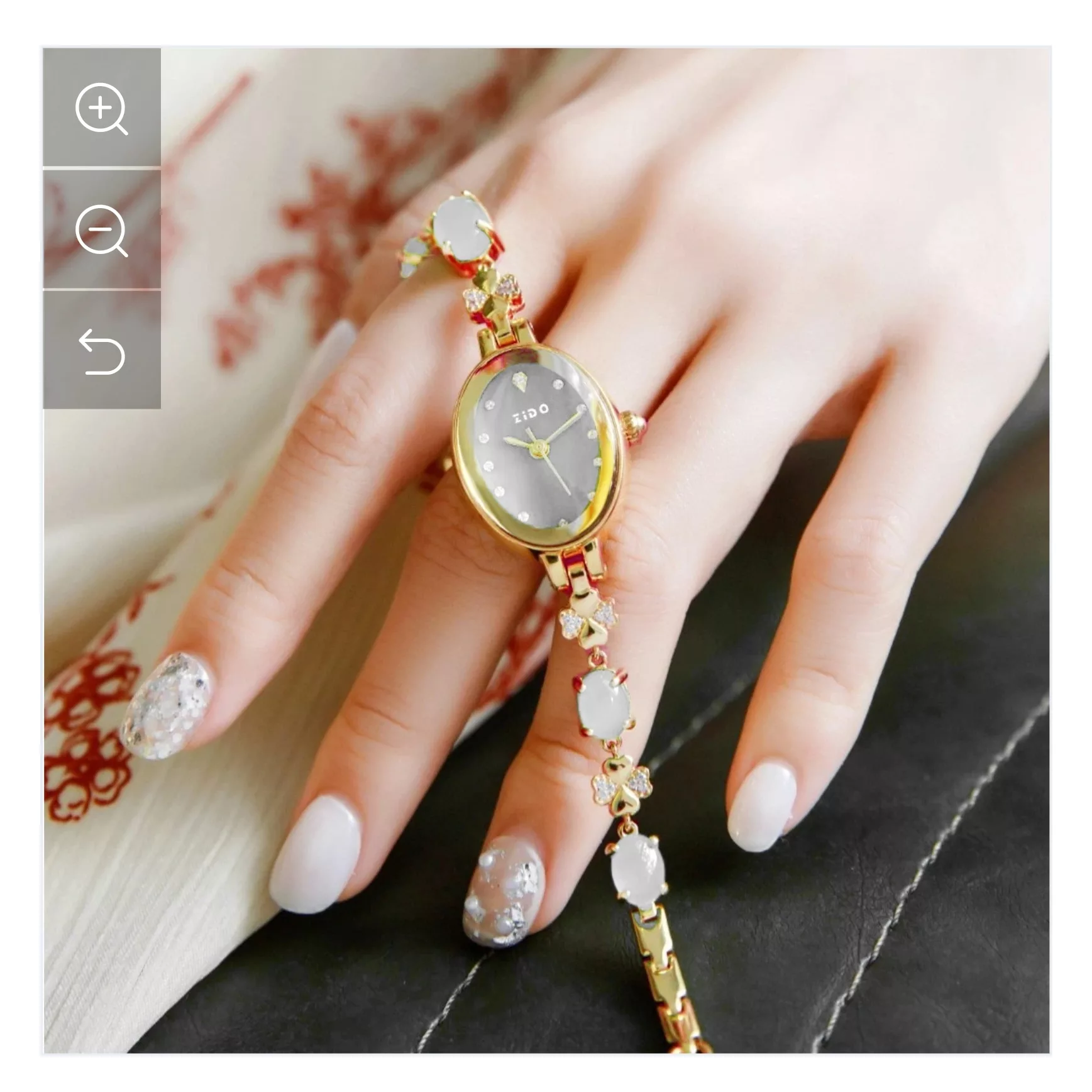 ساعت مچی عقربه ای زنانه مدل دستبندی بند نگین دار