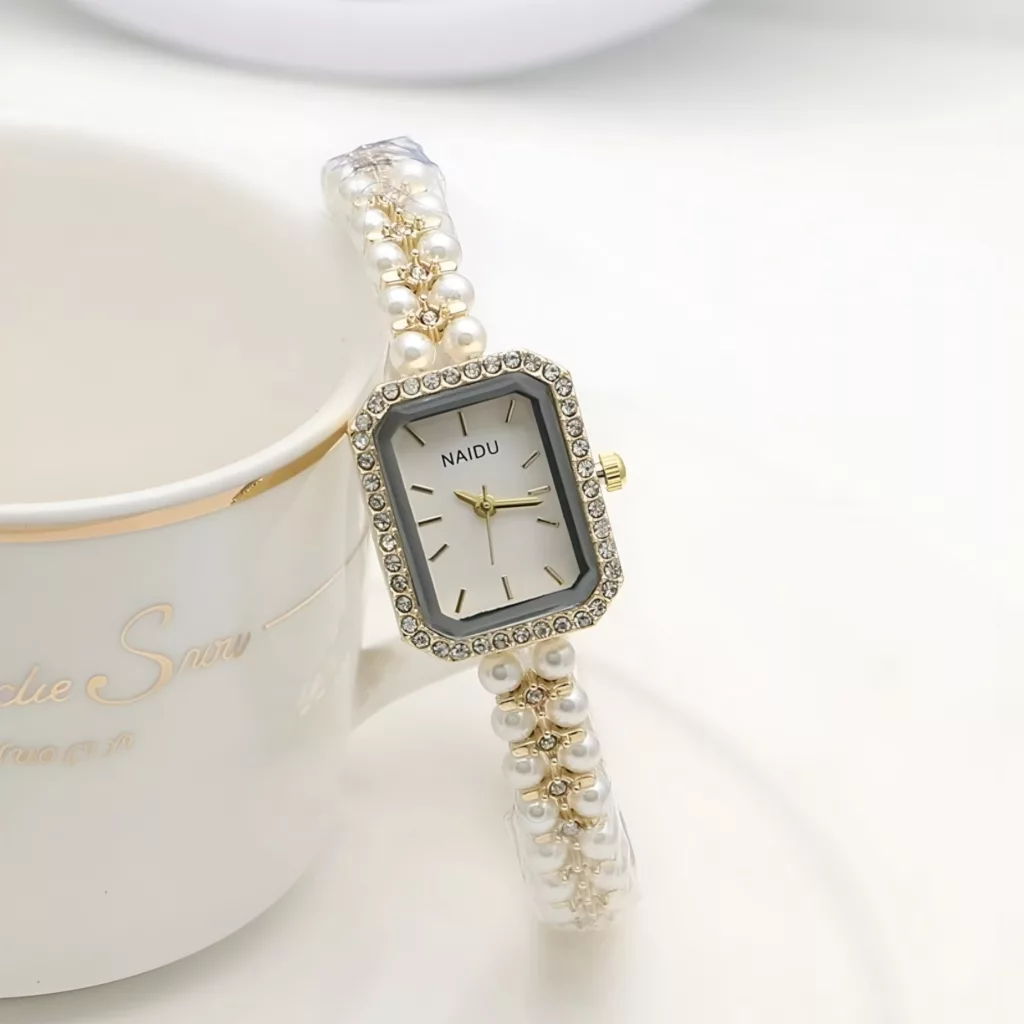 ساعت مچی عقربه‌ای کوارتز زنانه مدل لوکس بند مرواریدی دستبندی کد ۳