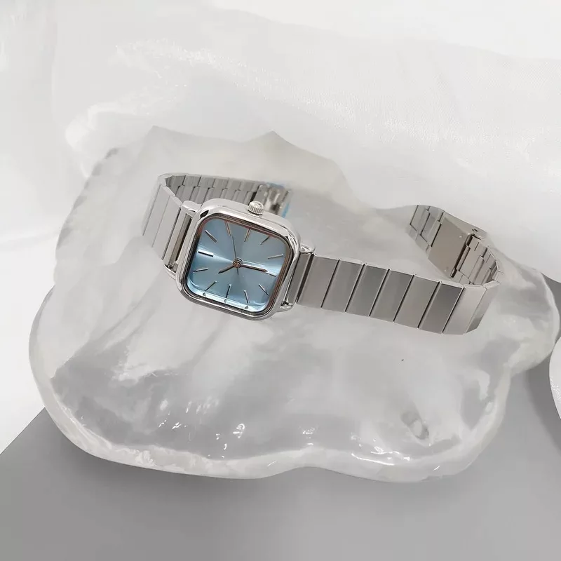 ساعت مچی عقربه ای زنانه مدل کلاسیک بند ریلی فلزی کد 2