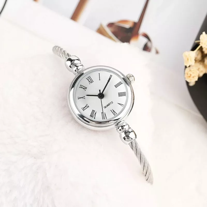 ساعت مچی عقربه ای زنانه مدل فنری النگویی کد 1