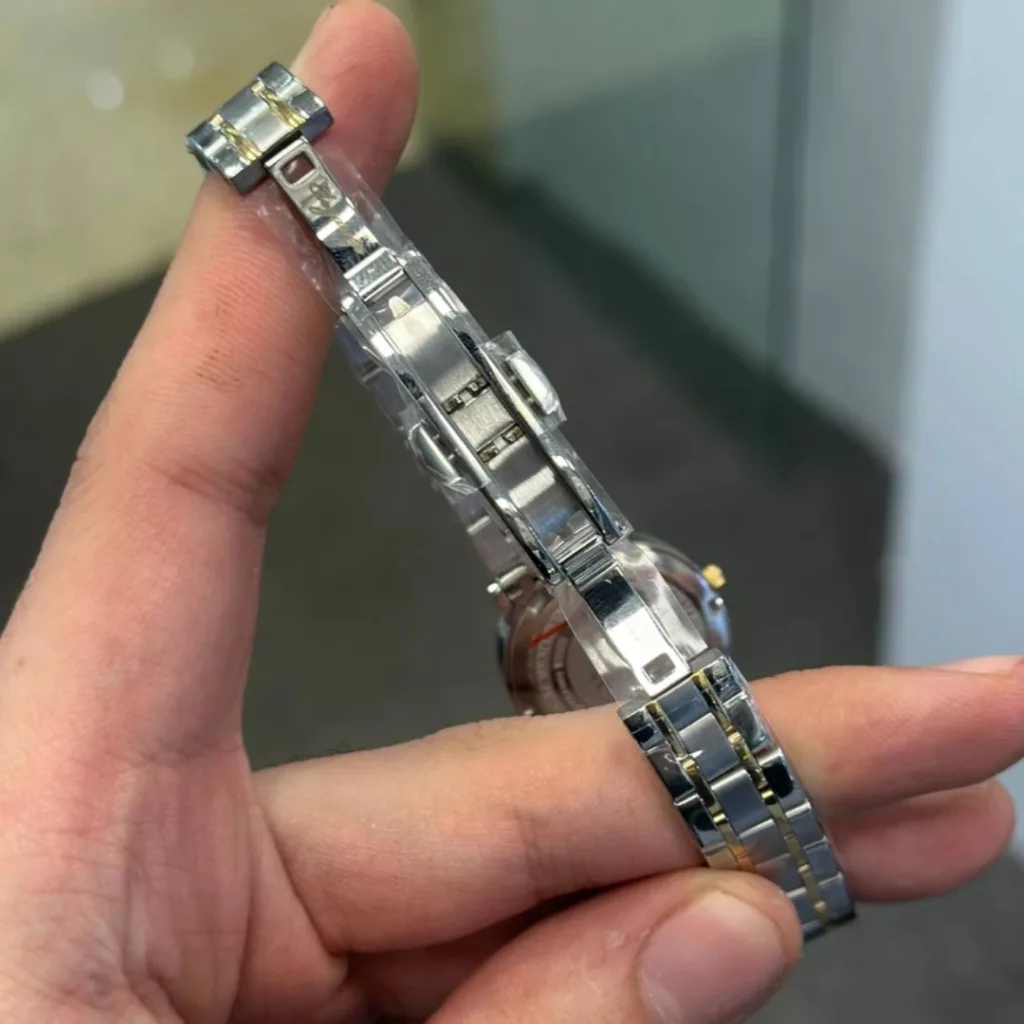 ساعت مچی عقربه‌ای کوارتز زنانه الگانس مدل لوکس بند استیل قاب دور نگین کد E5