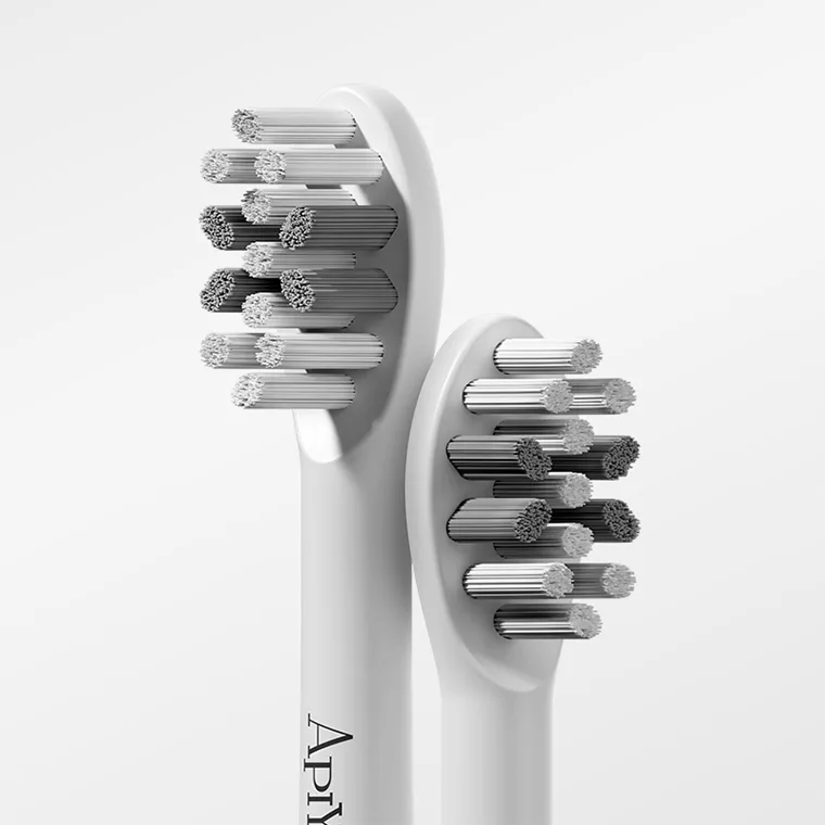 مسواک برقی آپیو مدل T12-A به همراه 4 سری یدک مجموعه 2 عددی