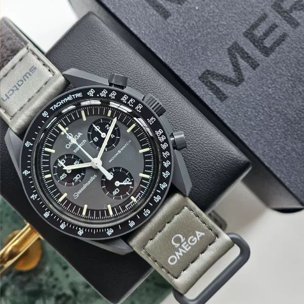 ساعت مچی عقربه‌ای مکانیکی مدل Swatch x Omega Bioceramic Moonswatch Mission to the Sun