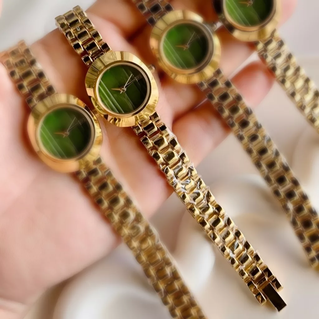 ساعت مچی عقربه‌ای کوارتز زنانه مدل لوکس بند استیل تقویم دار قفل دستبندی کد ۱