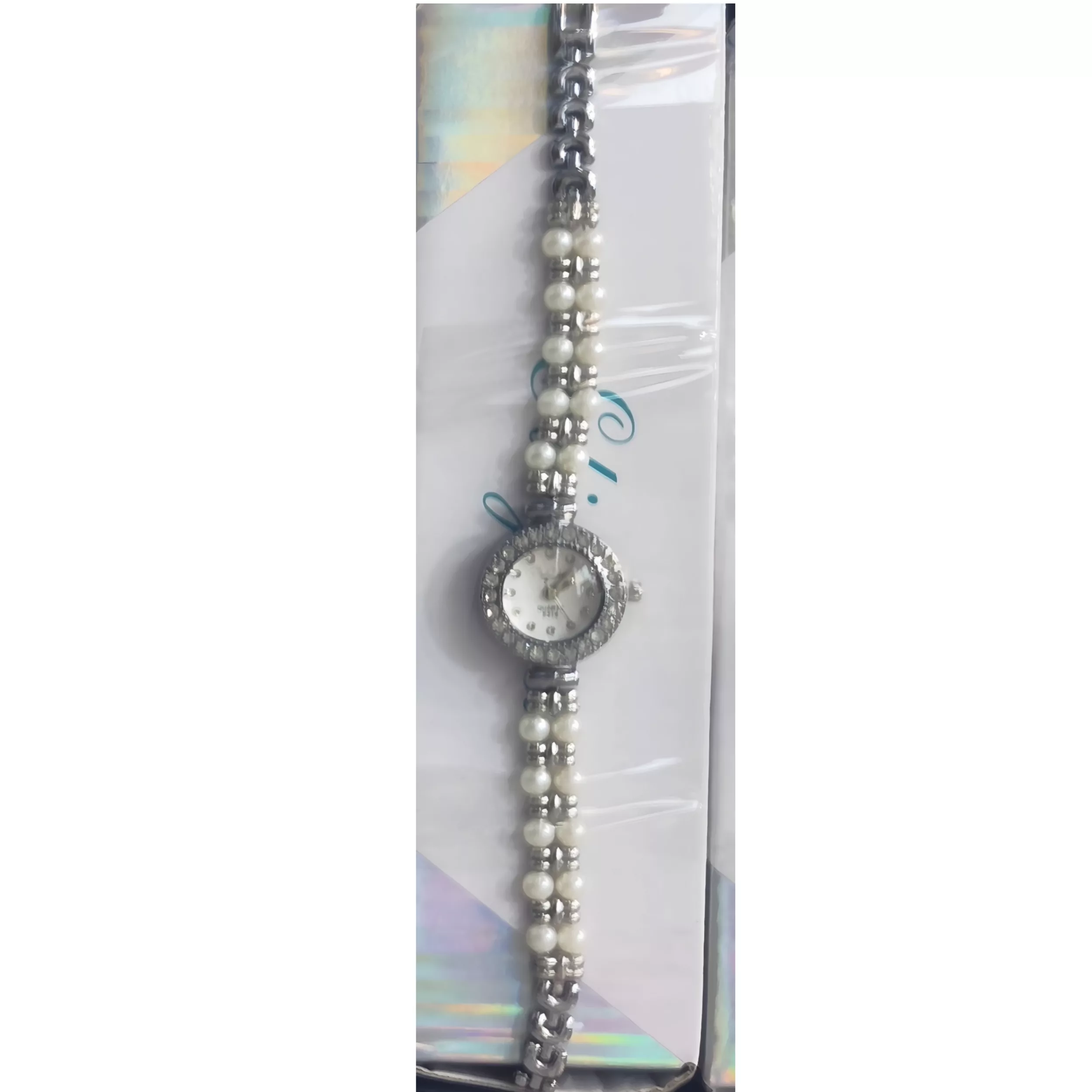 ساعت مچی عقربه‌ای کوارتز زنانه مدل لوکس بند دستبندی مرواریدی قاب دور نگین کد ۱.۸