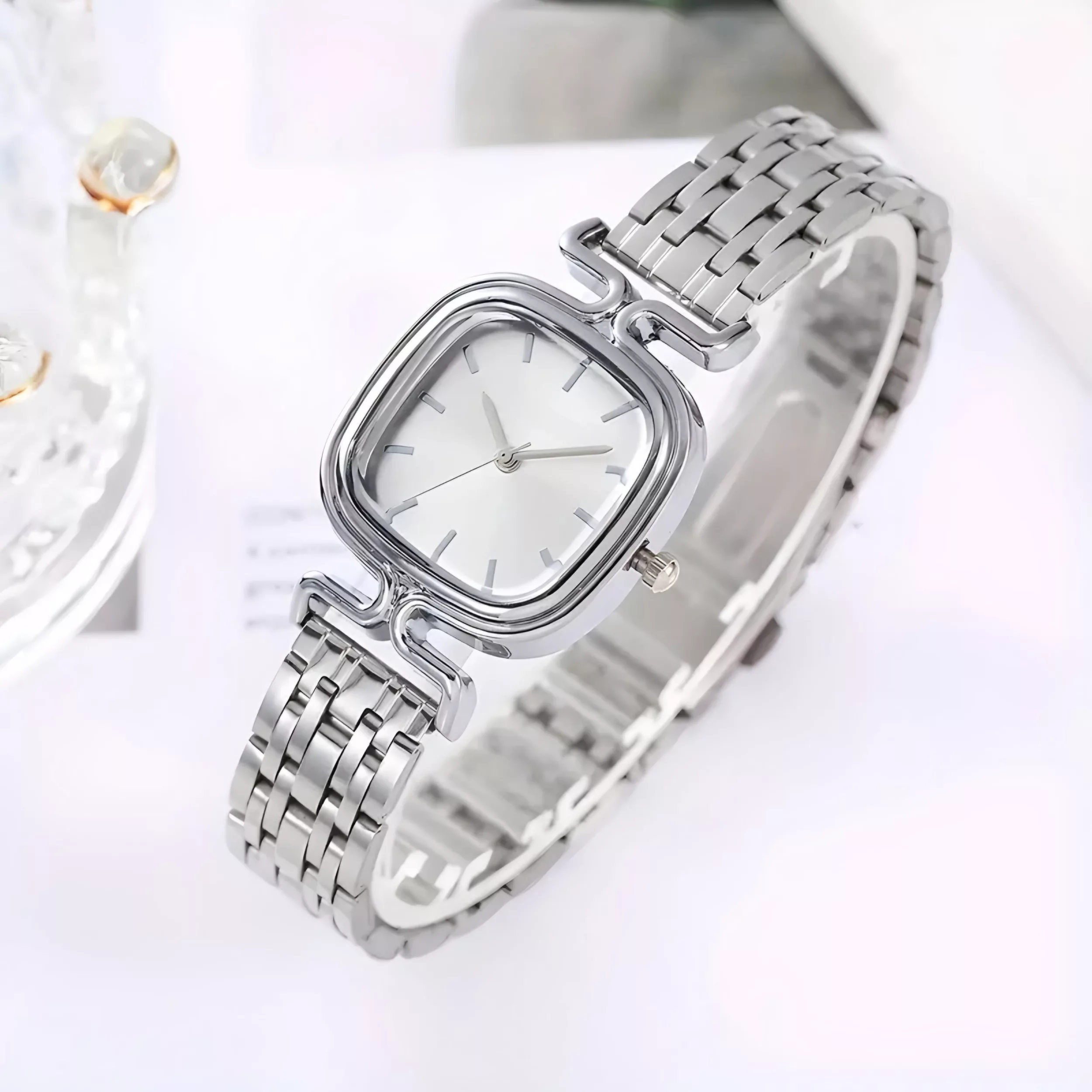 ساعت مچی عقربه ای زنانه مدل مینیمال کلاسیک بند استیل کد ۹.۹