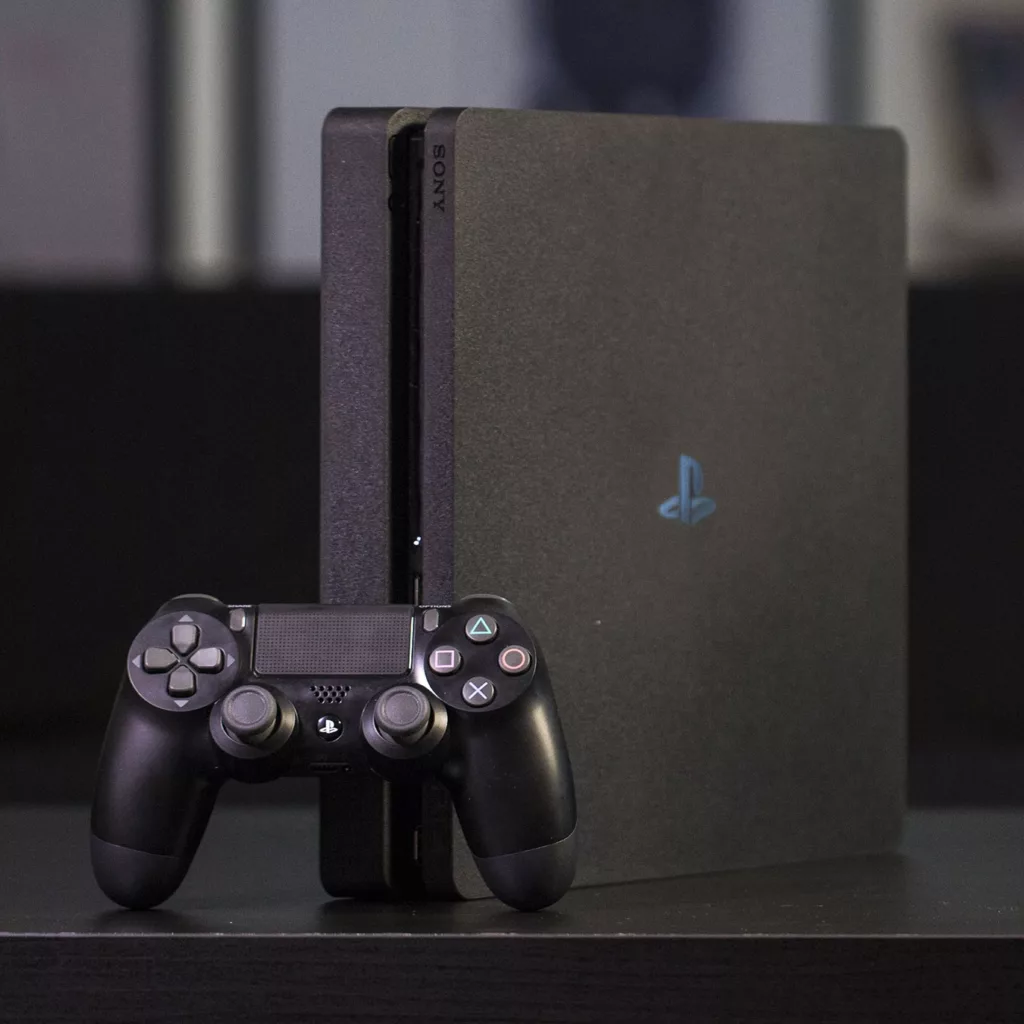 کنسول بازی سونی مدل Playstation 4 Slim ریجن 3 سری CUH-2218B ظرفیت 1 ترابایت به همراه کارت نصب 20 عدد بازی