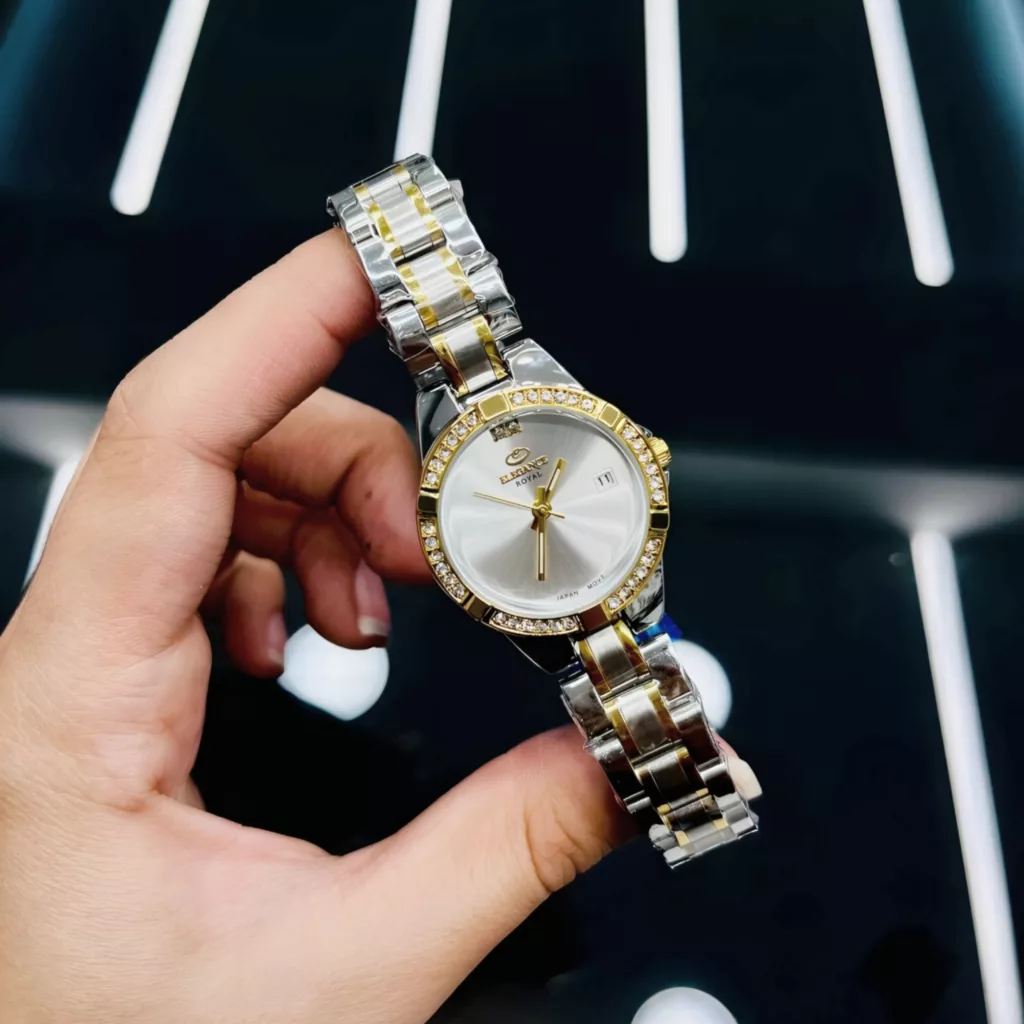 ساعت مچی عقربه‌ای کوارتز زنانه الگانس مدل لوکس بند استیل قاب دور نگین کد E4