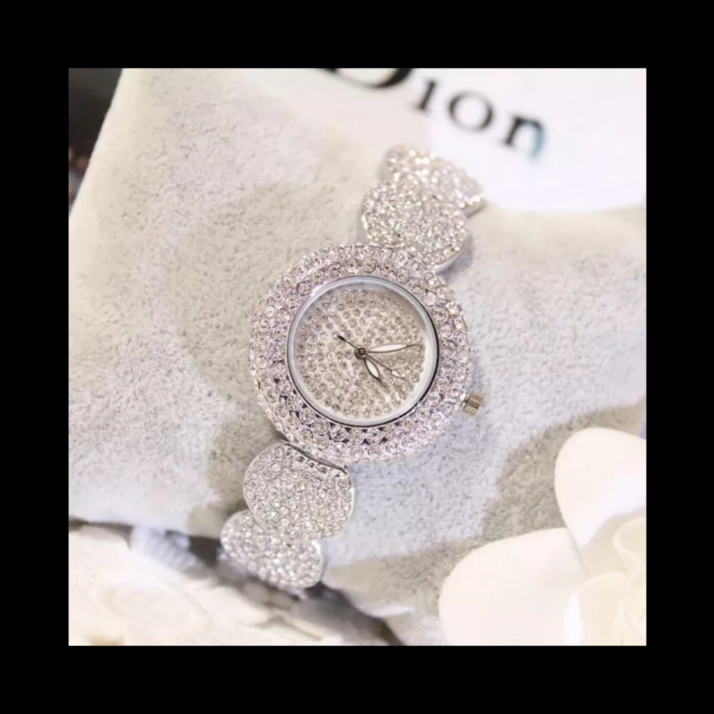 ساعت مچی عقربه ای زنانه مدل دستبندی فول نگین استون طرح جواهر