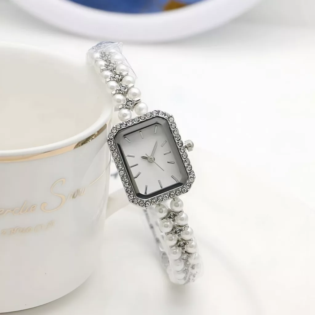 ساعت مچی عقربه‌ای کوارتز زنانه مدل لوکس بند مرواریدی دستبندی کد ۲