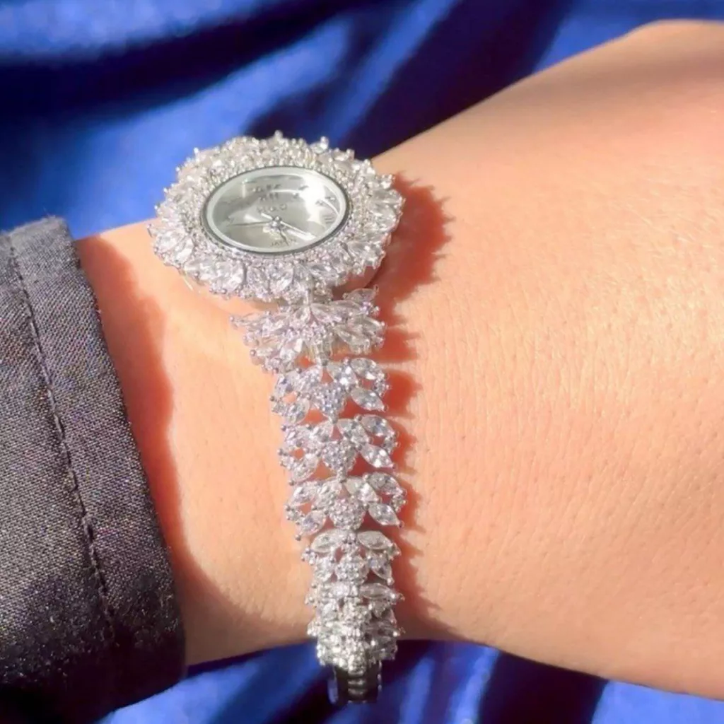 ساعت مچی عقربه ای نقره زنانه مدل 09