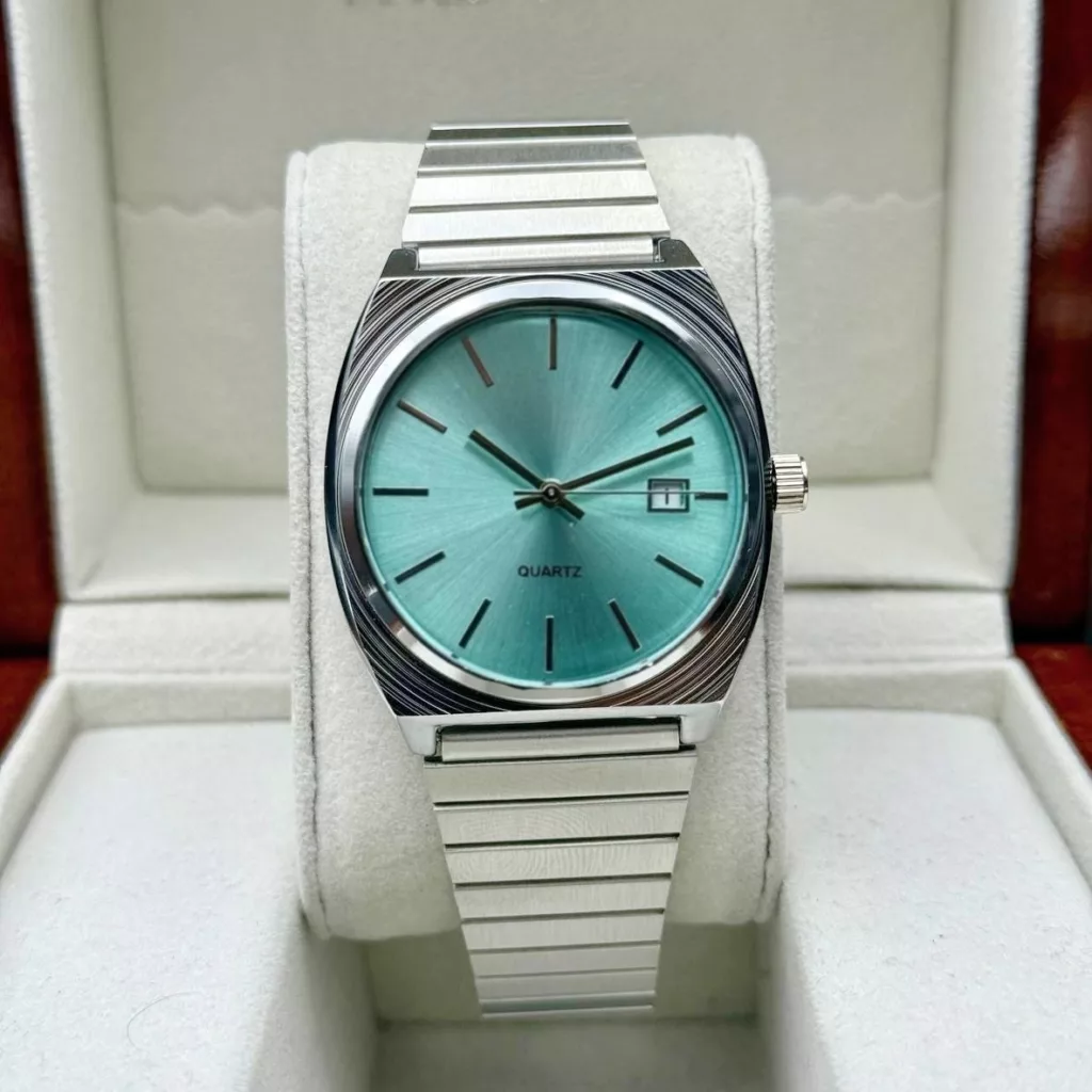 ساعت مچی عقربه‌ای کوارتز مردانه مدل اسپرت بند طرح شبکه ای کد TO1