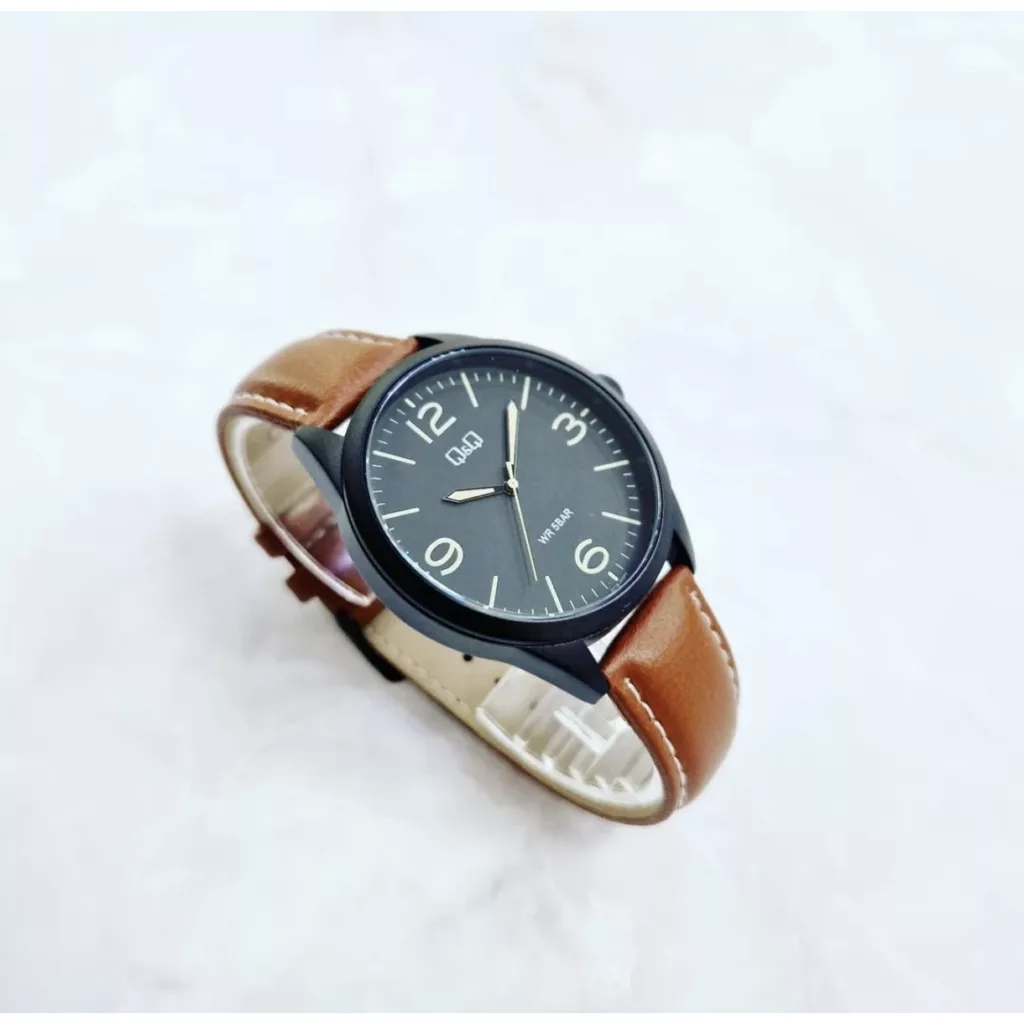 ساعت مچی عقربه‌ای کوارتز مردانه کیو اند کیو مدل Q77B-003