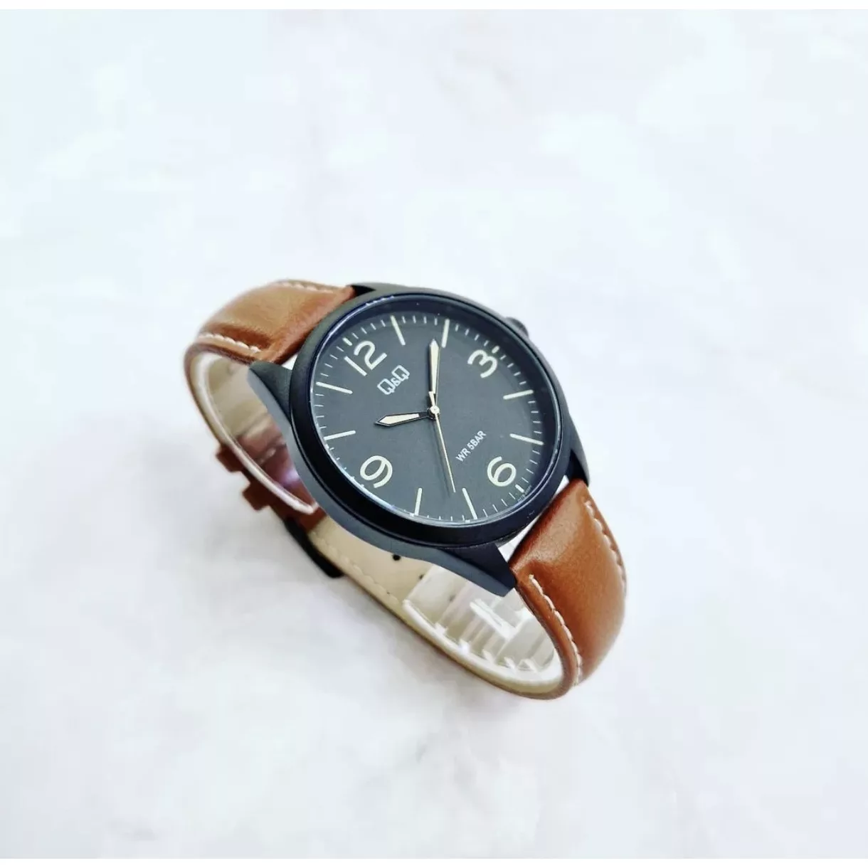 ساعت مچی عقربه‌ای کوارتز مردانه کیو اند کیو مدل Q77B-003