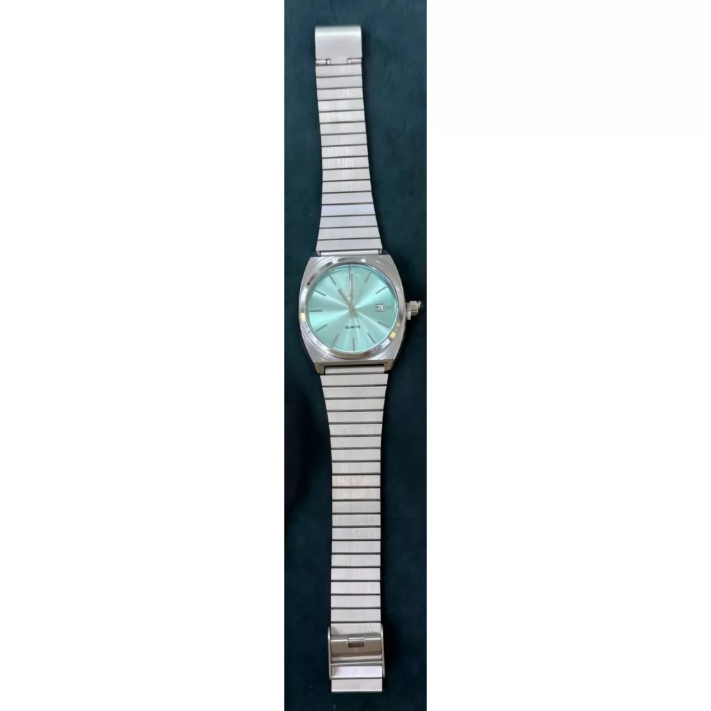 ساعت مچی عقربه‌ای کوارتز مردانه مدل اسپرت بند طرح شبکه ای کد TO1