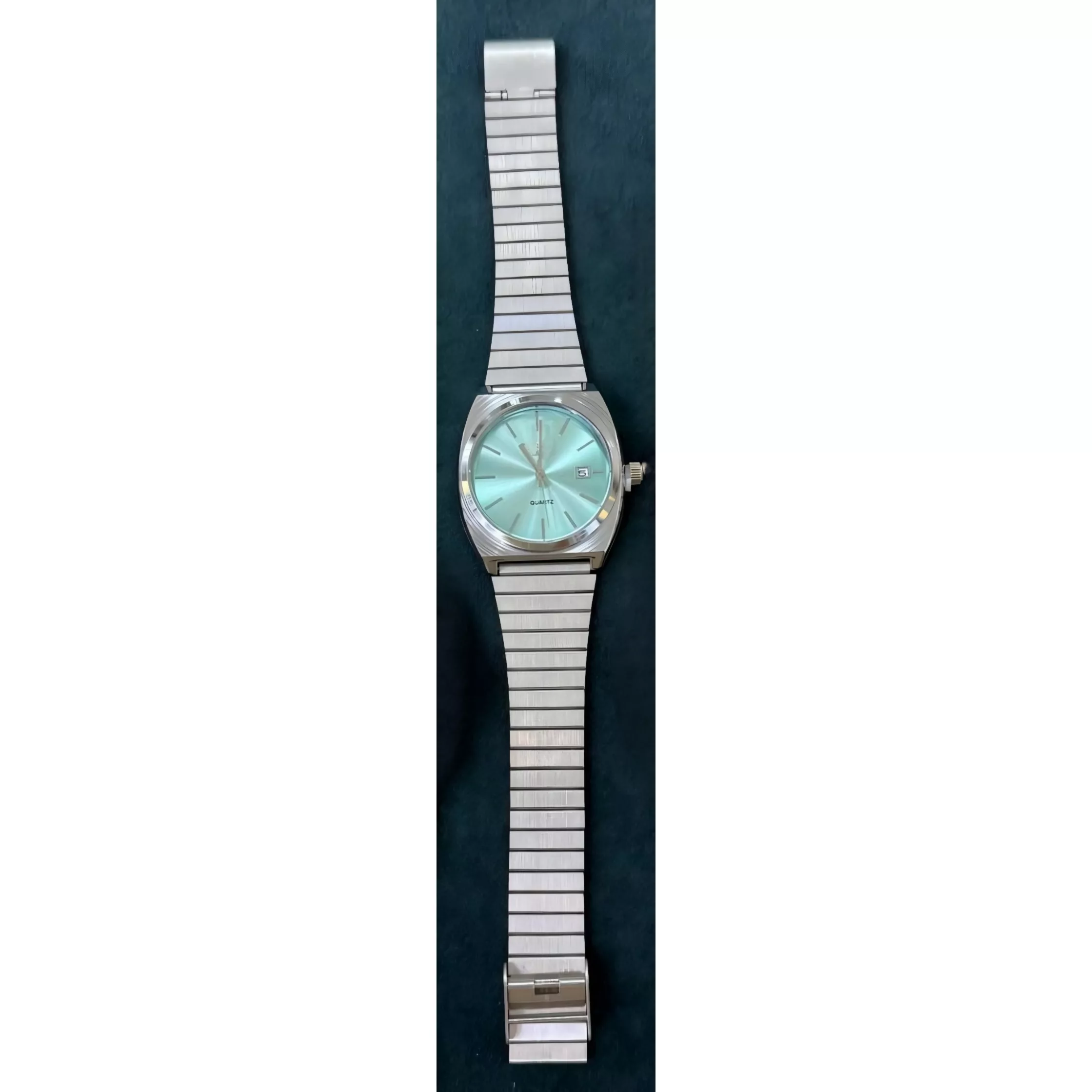 ساعت مچی عقربه‌ای کوارتز مردانه مدل اسپرت بند طرح شبکه ای کد TO1