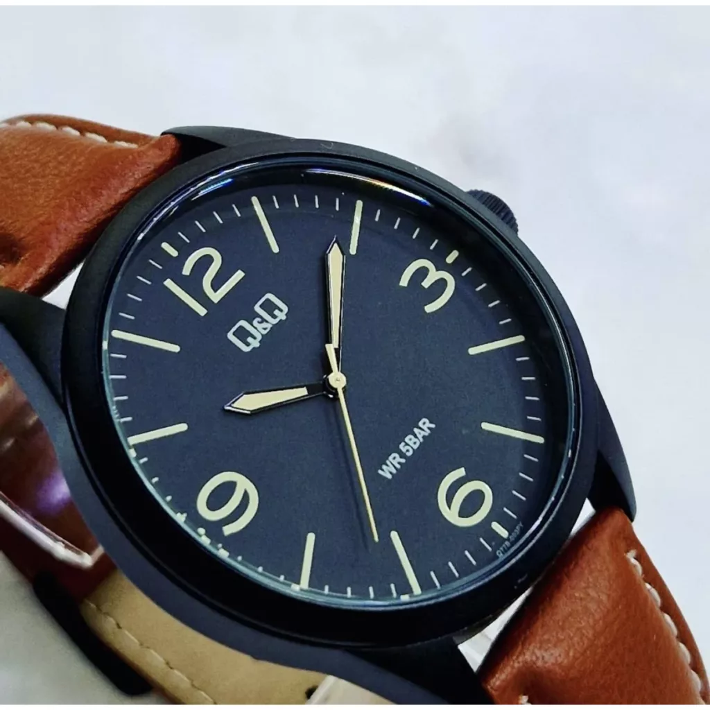 ساعت مچی عقربه‌ای کوارتز مردانه کیو اند کیو مدل Q77B-003