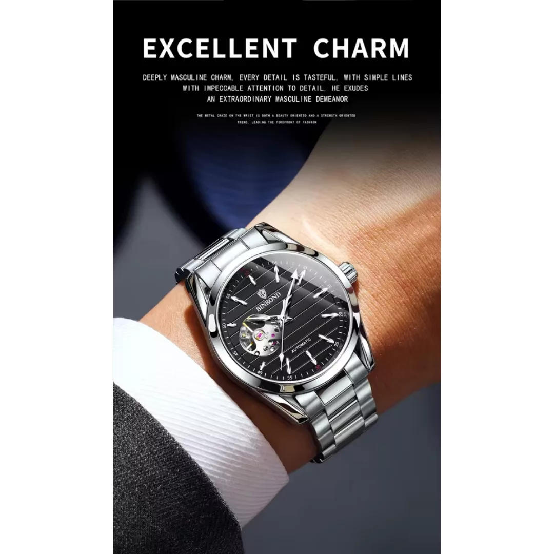ساعت مچی عقربه‌ای اتوماتیک مردانه بین باند مدل صفحه نیمه اسکلتون بند استیل کد ۲