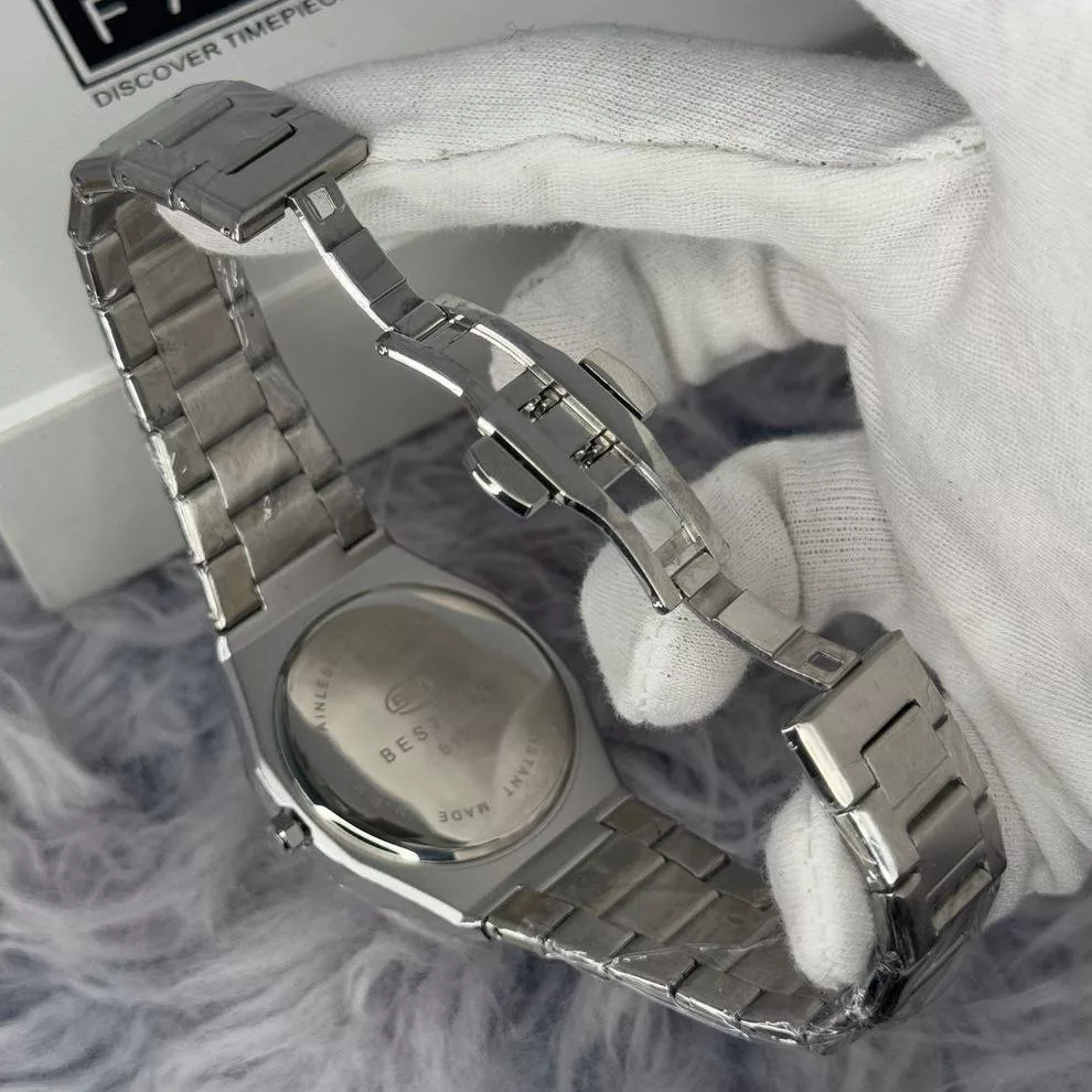 ساعت مچی عقربه‌ای کوارتز مردانه مدل کلاسیک صفحه خطی کد 010