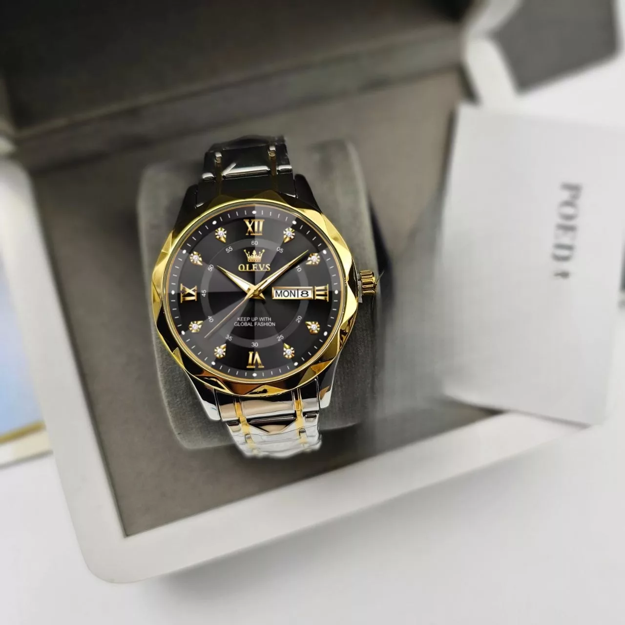 ساعت مچی عقربه‌ای کوارتز مردانه اُ لِوز مدل لوکس کلاسیک دی دیت بند طرح تراش الماسی قفل مخفی کد ۱