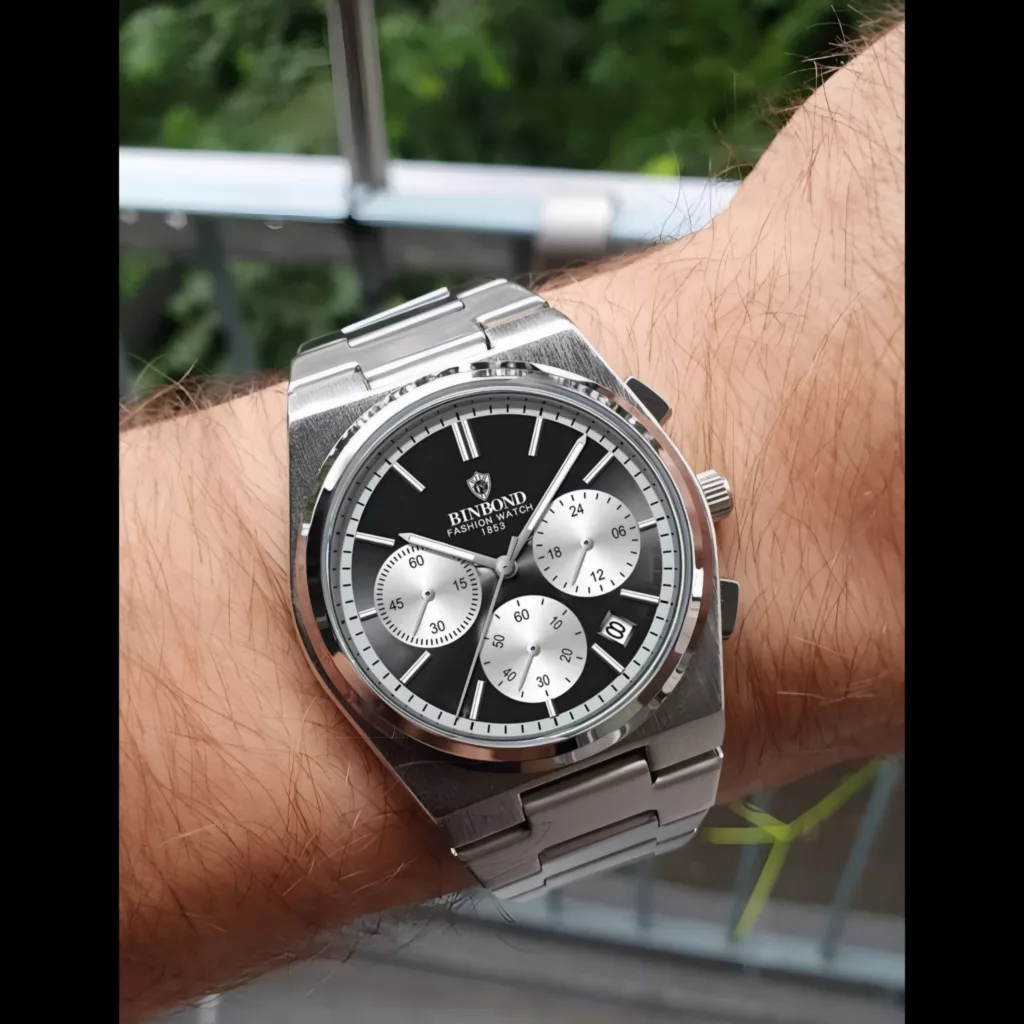 ساعت مچی عقربه‌ای کوارتز مردانه بین باند مدل  اسپرت سه موتور فعال کرنوگراف بند استیل قفل مخفی کد ۳