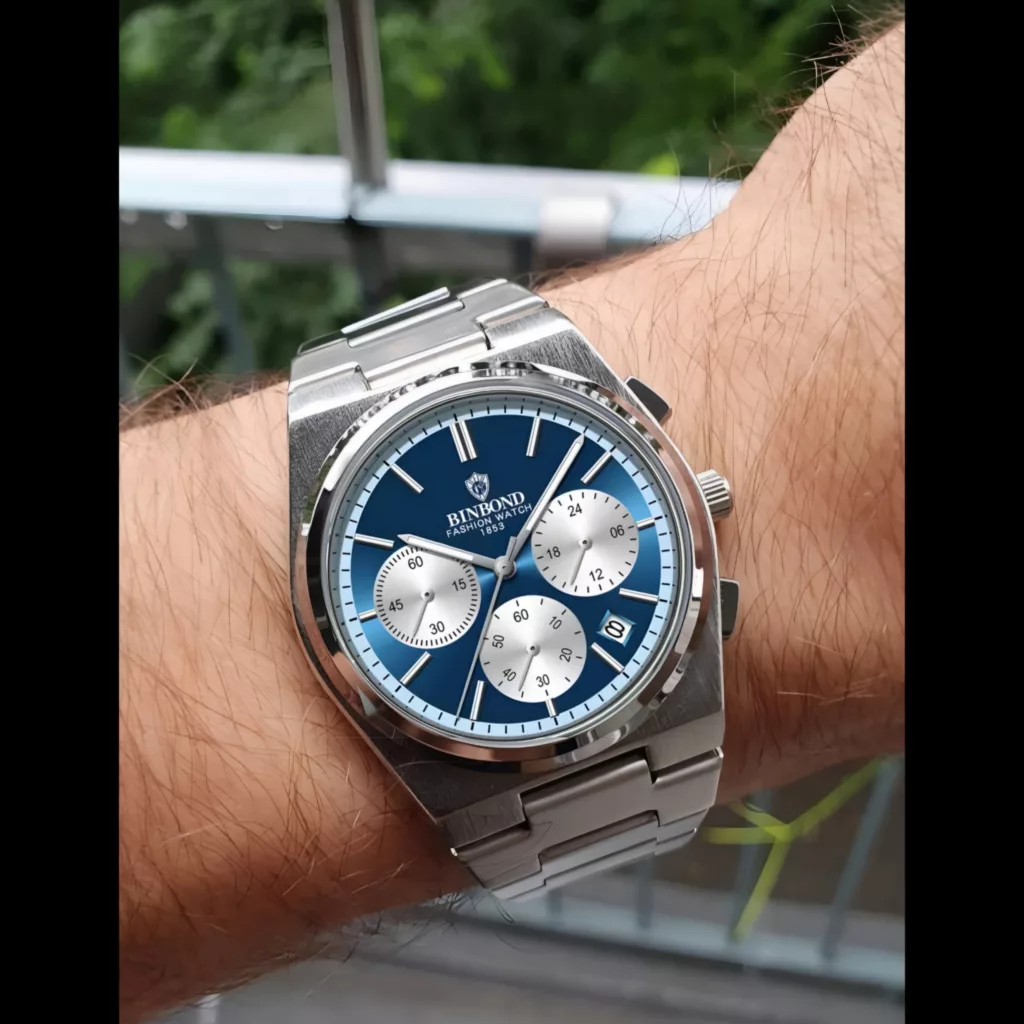 ساعت مچی عقربه‌ای کوارتز مردانه بین باند مدل  اسپرت سه موتور فعال کرنوگراف بند استیل قفل مخفی کد ۲