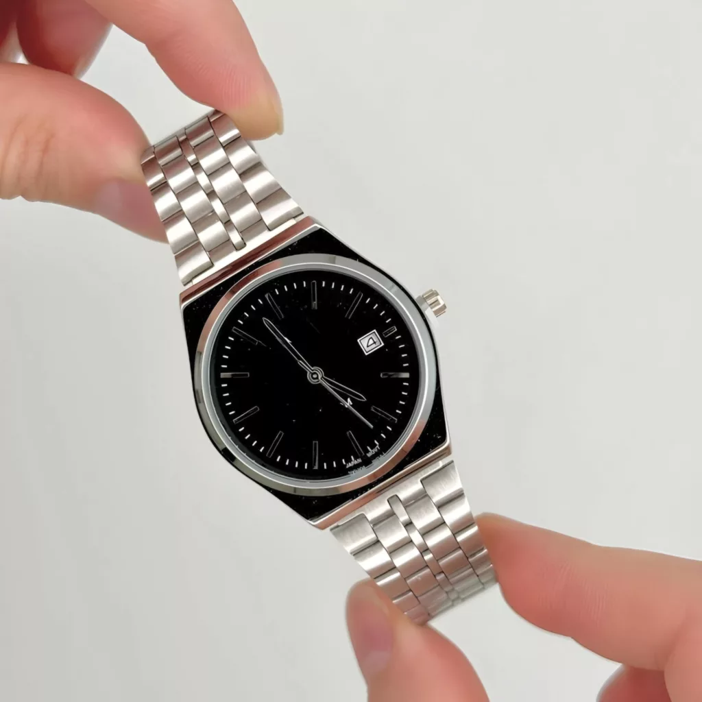 ساعت مچی عقربه‌ای کوارتز مردانه مدل کلاسیک بند استیل بافت ریز کد 2