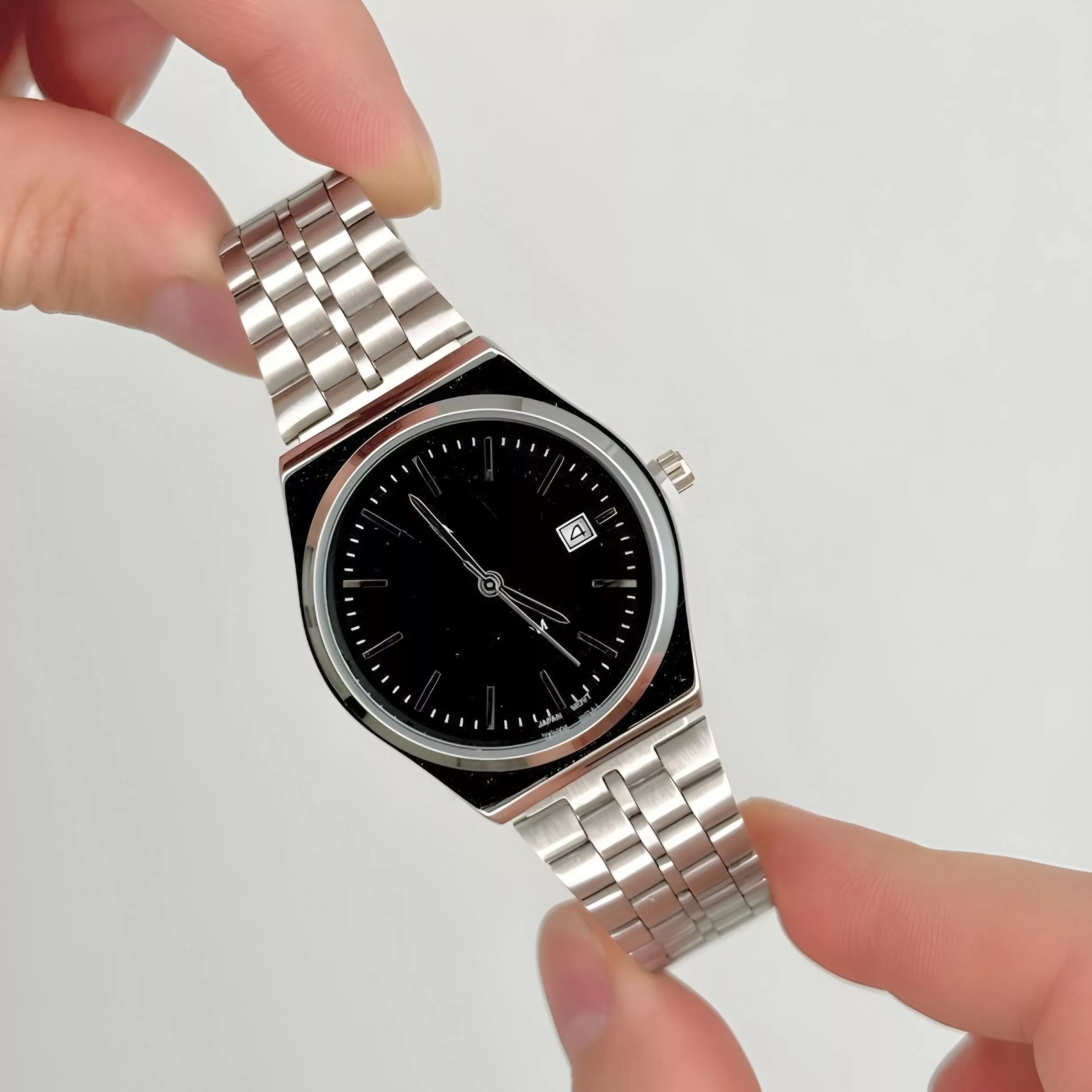 ساعت مچی عقربه‌ای کوارتز مردانه مدل کلاسیک بند استیل بافت ریز کد 2