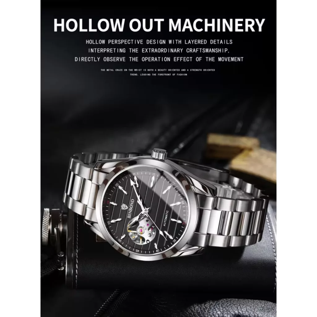 ساعت مچی عقربه‌ای اتوماتیک مردانه بین باند مدل صفحه نیمه اسکلتون بند استیل کد ۲