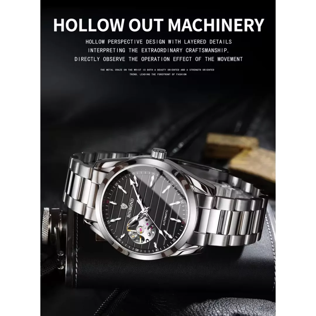 ساعت مچی عقربه‌ای اتوماتیک مردانه بین باند مدل صفحه نیمه اسکلتون بند استیل کد ۲
