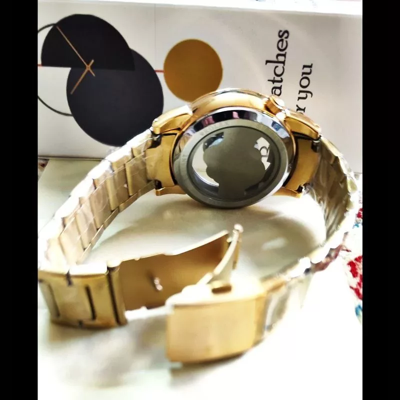 ساعت مچی عقربه‌ای مردانه  مدل موتور پیدا پشت شیشه ای