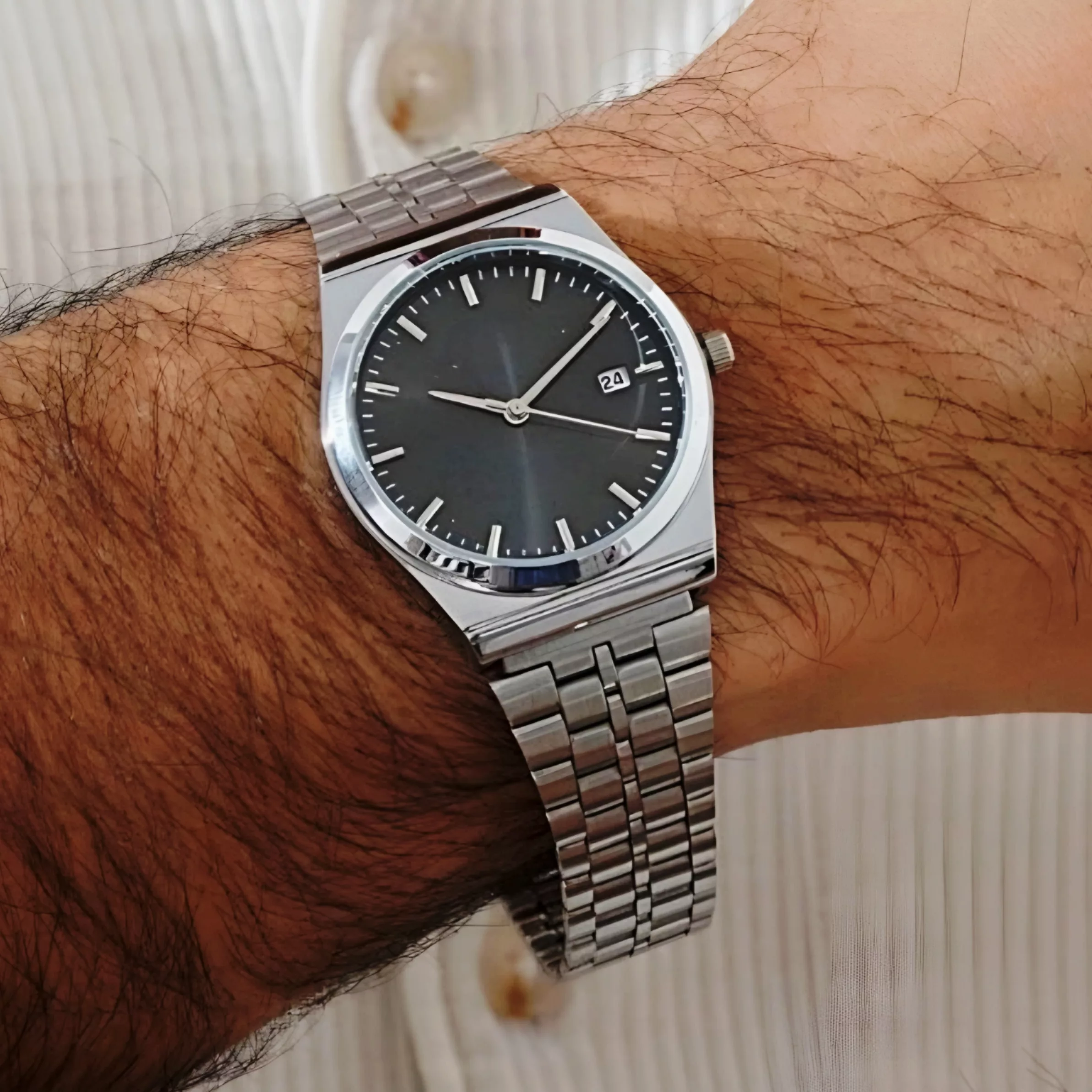 ساعت مچی عقربه‌ای کوارتز مردانه مدل کلاسیک بند استیل بافت ریز کد 2